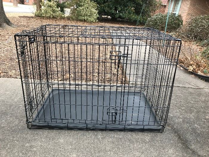 Very large dog crate.