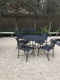 A pair of 48" round tables with four chairs for sale tables have cushions shown in the next photo asking $700 for each set Professionally powder coated.