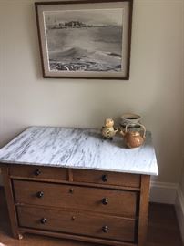 Another view of marble topped chest of drawers. pottery and original art for sale too