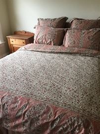 Yves Delorme bedding, custom queen headboard with matching bed skirt