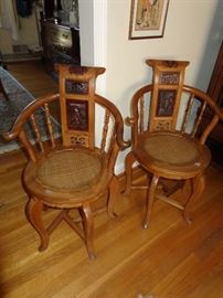 Pair of antique Chinese Zhejiang carved horseshoe chairs.