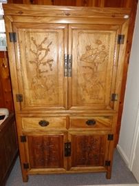 100 year old Chinese Wenzhou carved camphor cabinet.