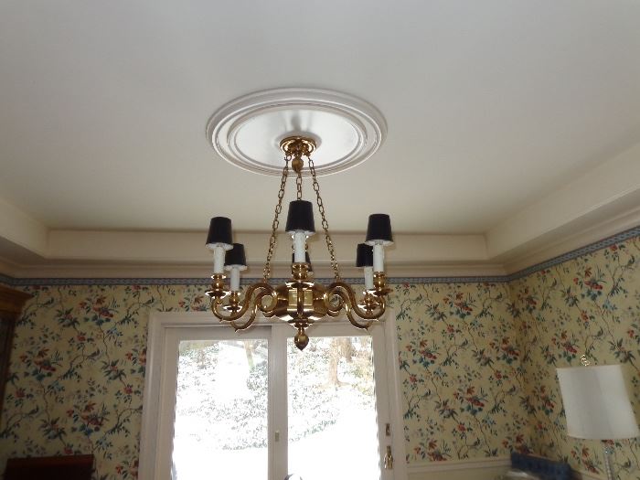 Lovely brass 6-arm chandelier. Requires a licensed electrician to remove. 