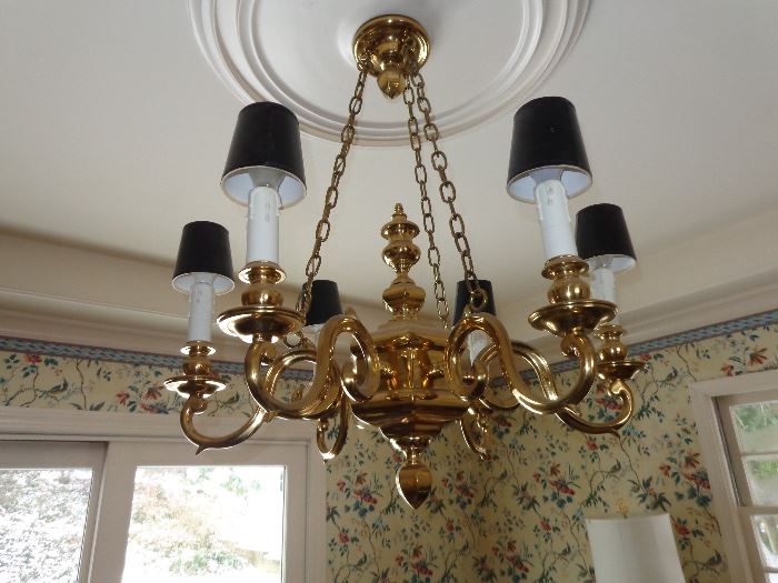 Lovely brass 6-arm chandelier. Requires a licensed electrician to remove. 
