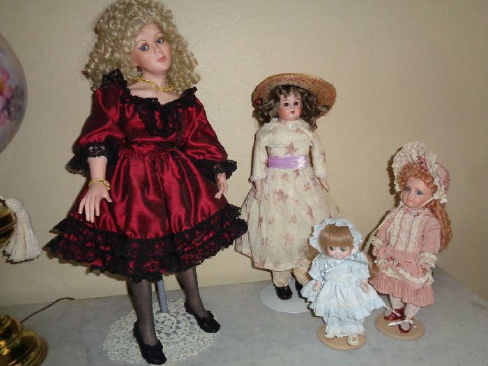 several hand painted dolls