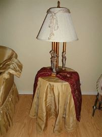 base under the cloth is a vintage table