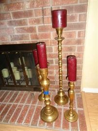 5 of these brass candle sticks