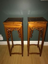 Occasional tables with intricate woodwork