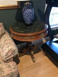 Marble top occasional table with intricate design