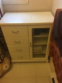 Bathroom cabinet with four drawers. 