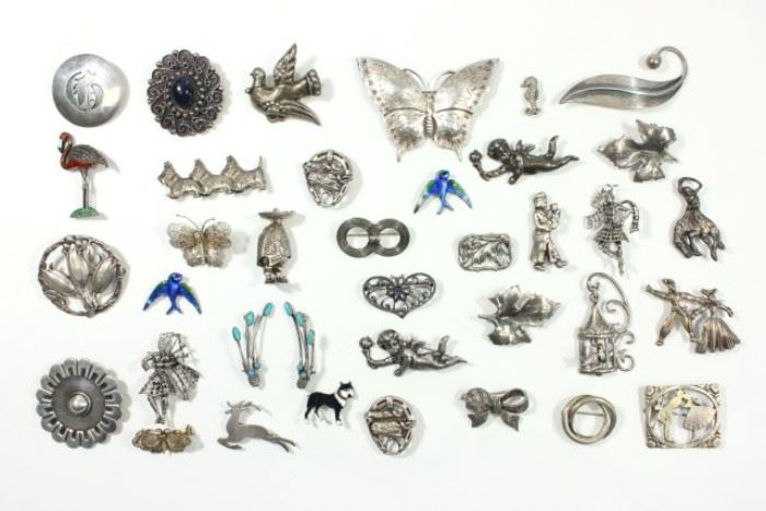 Lot 202: Group 37 Vintage Silver Brooches
