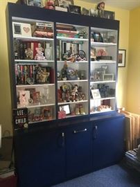 Books & collectibles & blue wall unit