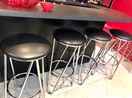 Four chrome & leather bar stools