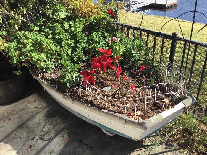 dinghy boat planter on wheels $100 or best offer