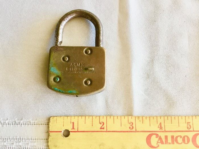 Acme lever style padlock with no key $36