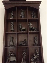Pewter figurines, each with their own story card, sold as a set with display case