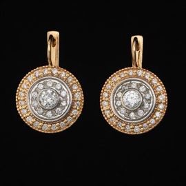 A Pair of Diamond Earrings 