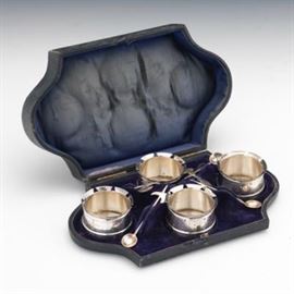 Four Silver Plated Castle and Halberd Salt Cellars and Spoons