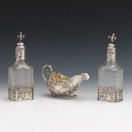 German Baroque Style Silver Pair of Etched Glass and Silver Overlay Ice Wine Decanters and German Silver Sauce Boat, Hanau, ca. Late 19th Century 