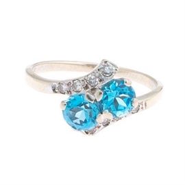 Ladies Gold, Blue Topaz and Diamond Bypass Ring 