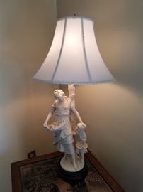 One of pair of figural lamps