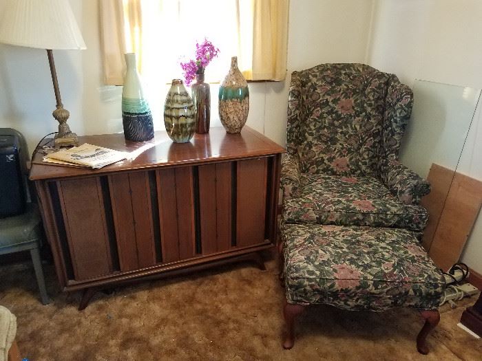 Like new Sam Moore Wing Back Chair and Ottoman          Mid Century Cabinet with a speaker in one section on left side.