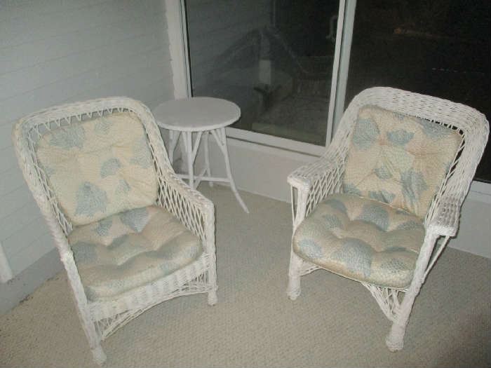 Antique wicker chairs and round wicker