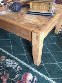 Cool antique distressed wood coffee table, probably reclaimed barn wood