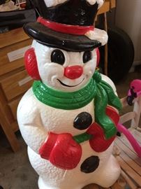 about 3 feet tall Frosty, also a Santa to match