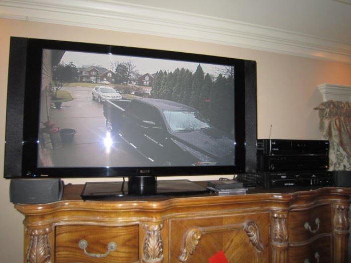Pioneer flatscreen tv with added speaker system and receiver