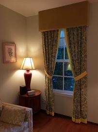 Lamps, side table and drapes