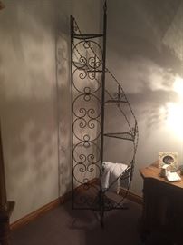 Wrought iron stairway plant stand