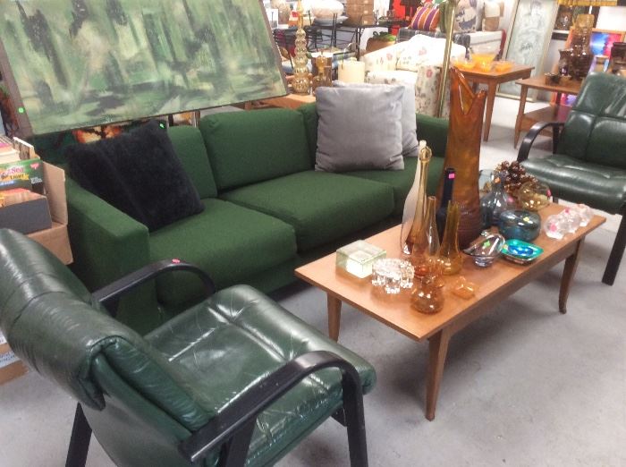 Green abstract art, green Milo Baughman sofa, green leather LAZYBOY chairs, MCM coffee table, assorted retro glass