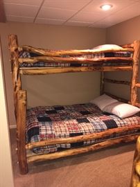 Two sets of Log Bunk Beds.  Twin over full