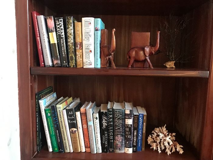 Books and wooden elephant bookends 