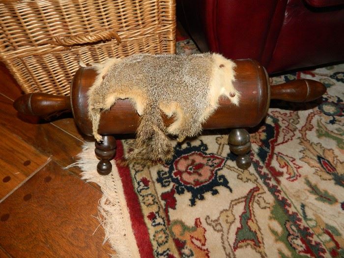 Gout stool with squirrel skin for some reason.