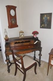 Antique writing desk with several cubbies and small storage compartments