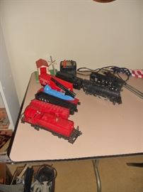 1.	Lionel Train Locomotive Engine 2018 (027 scale) with Tender 243w, transformer, track and additional cars
2.	Lionel Train (027 scale) Red Diesel Switcher MKT 600 Locomotive with transformer, track and additional cars