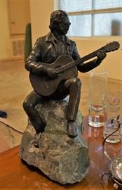 Bronze guitarist statue