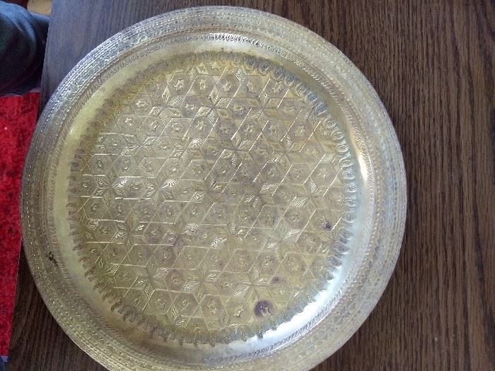 Cool old  Arabic copper hanging plate. Nice design, 12" diameter. 