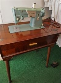 Singer sewing machine cabinet