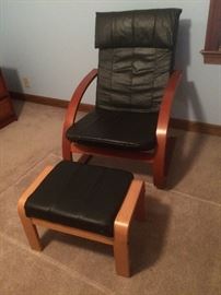 faux leather and teak chair and matching ottoman