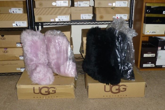 2 pairs of the Original Fluff Momma Ugg Boots never worn. The black pair has been sold. Pink still available.