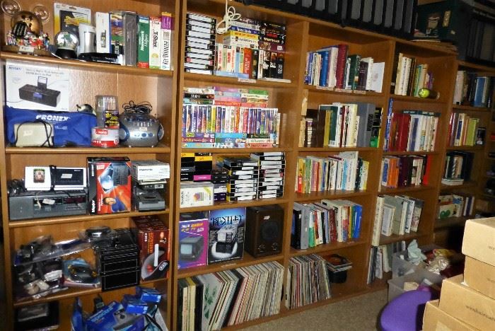 Read, watch or listen. Vintage media - VHS tapes, LPs, books, players. 