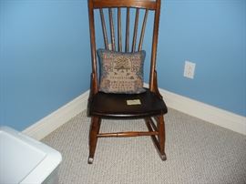 Solid wood rocker.