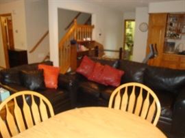 Black leather sofa and chair