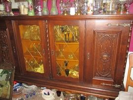 Breakfront purchased in Germany in 1969. Hand carved, Black Forest.