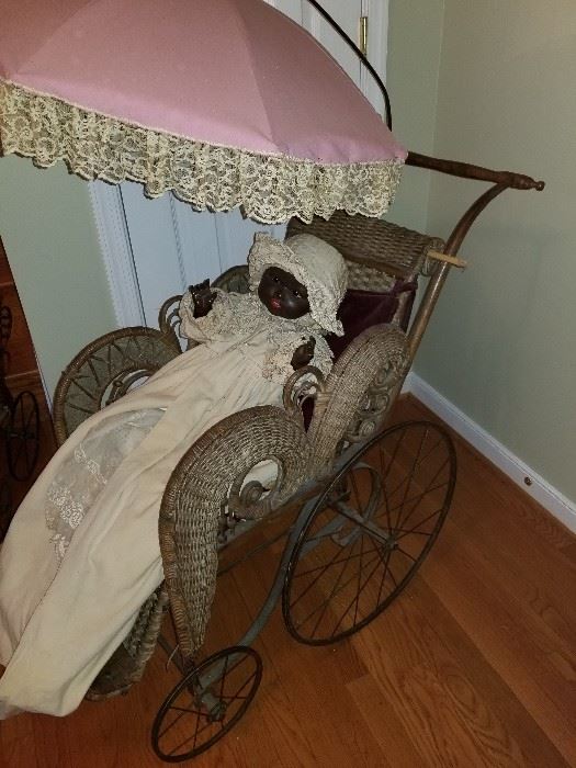 antique bisque black baby in stroller