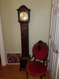 tall clock and Victorian chair