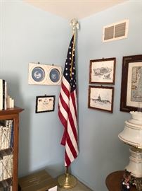 An American Flag with the certificate for being flown at the White House